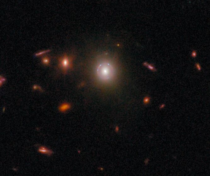 Gravitational lens COSJ095921+020638