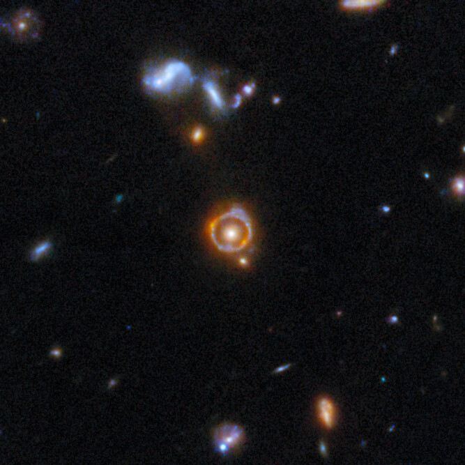 Gravitational lens COSJ100024+015334