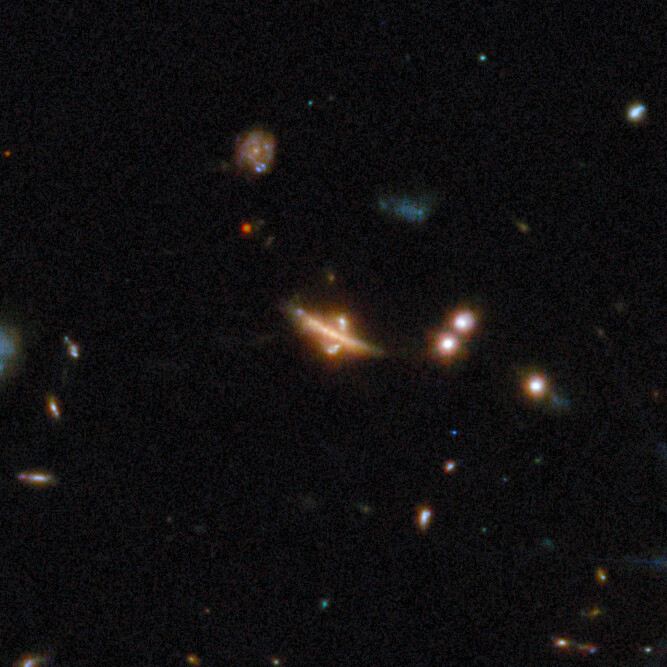 Gravitational lens COSJ100025+015245