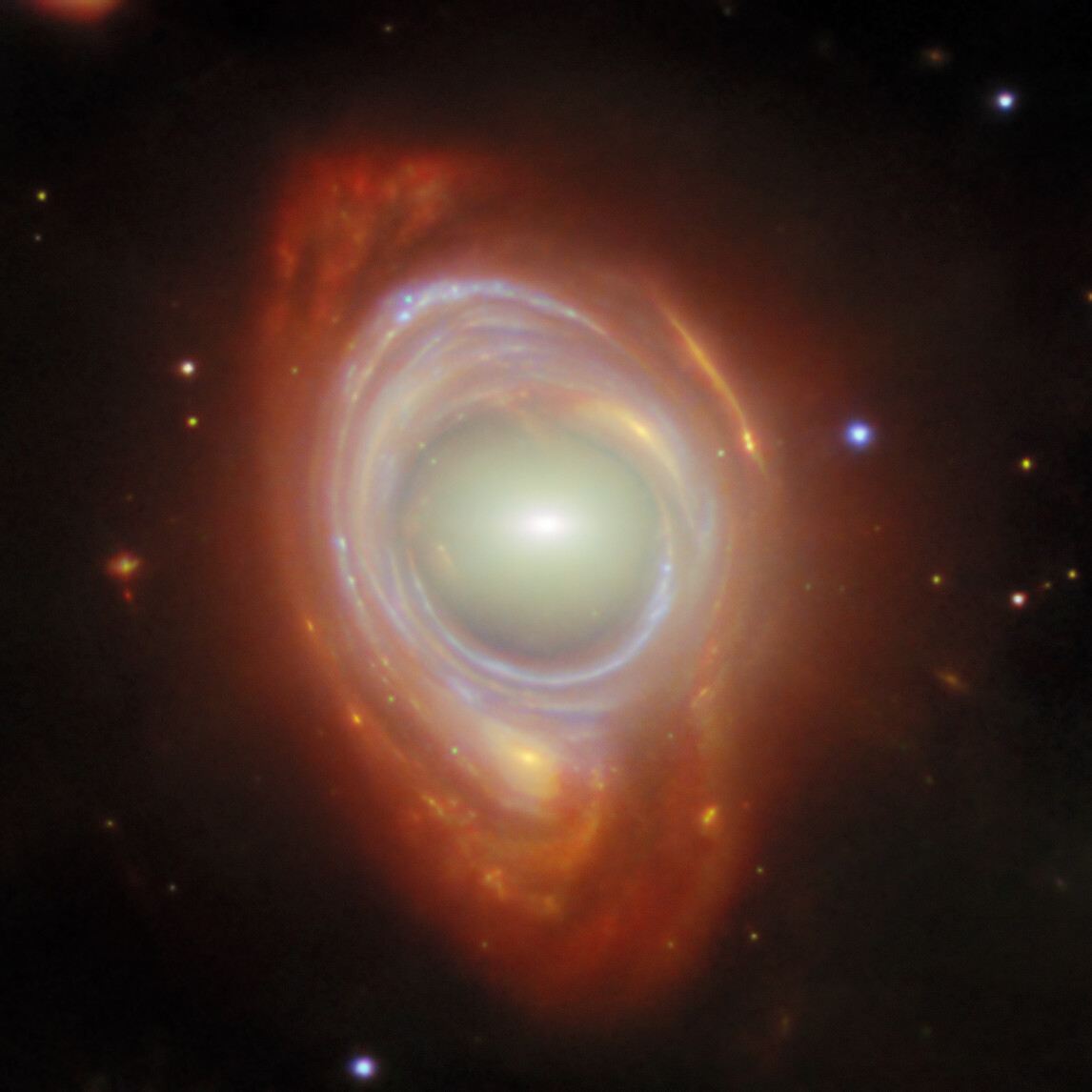 Spying a spiral through a cosmic lens