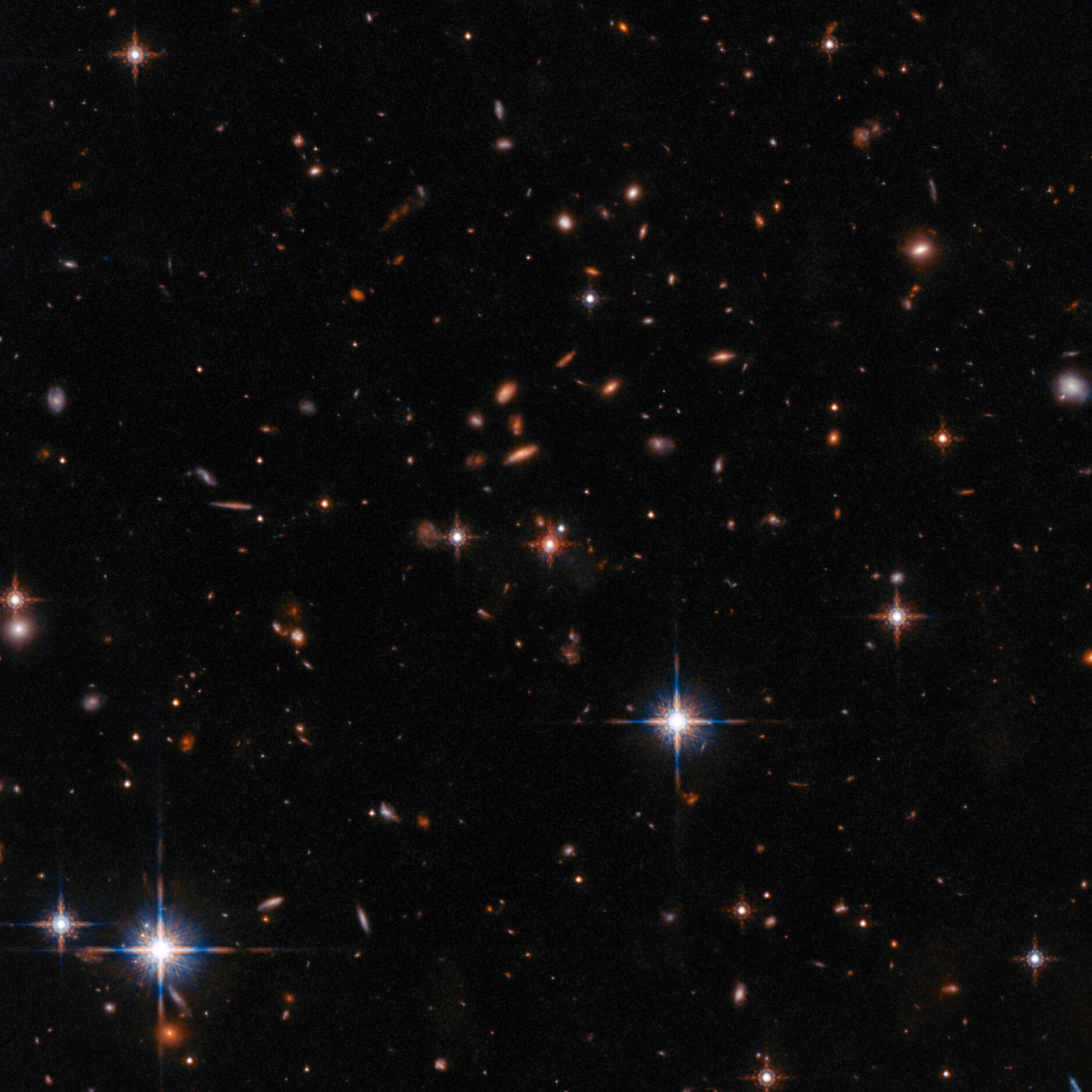 Wide Field Hubble View of Extremely Red Quasar SDSS J165202.64+172852.3