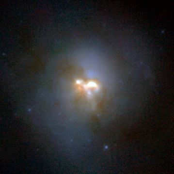 A Collision in the Heart of a Galaxy