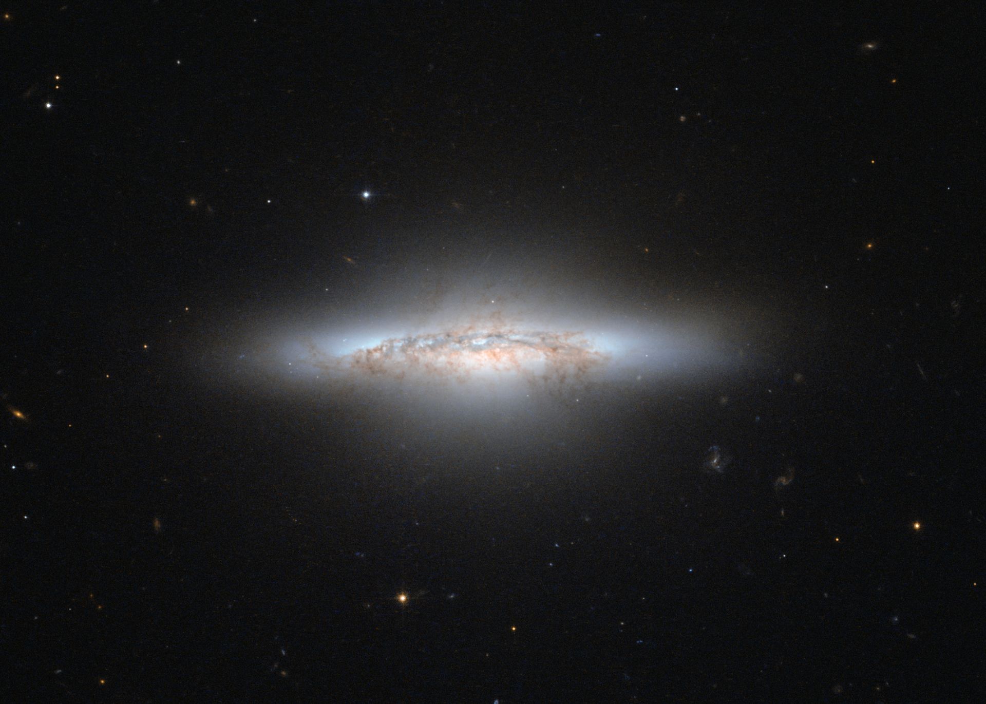 A galaxy colourfully waning