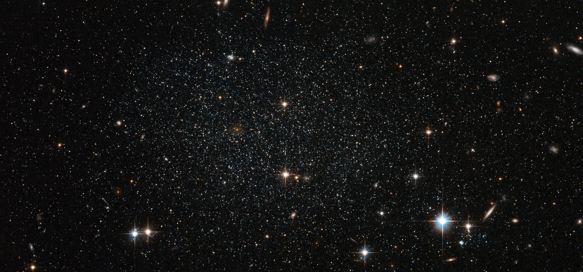 Antlia dwarf galaxy peppers the sky with stars