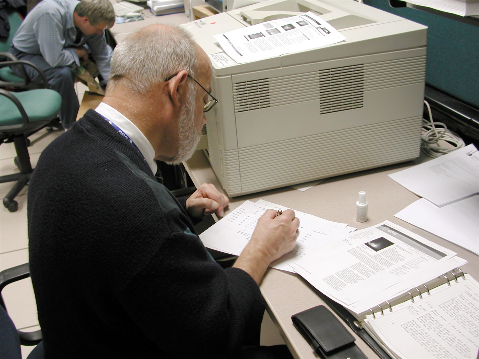 Antonius (Ton) Linssen at work in his corner in the &lsquo;Attached Shuttle Payload Control Center&rsquo;