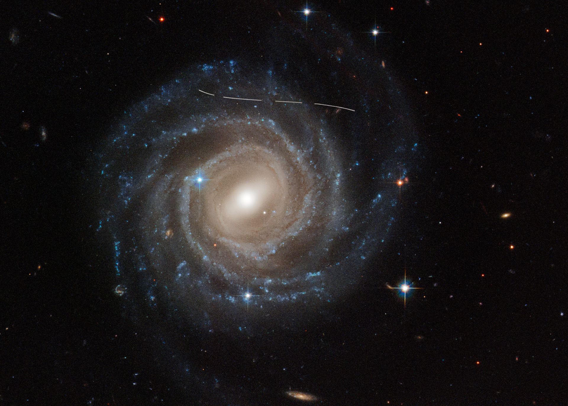 Asteroid photobombs Hubble snapshot of Galaxy UGC 12158