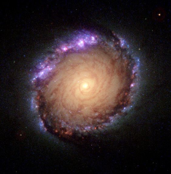 Composite ultraviolet-visible-infrared image of NGC 1512