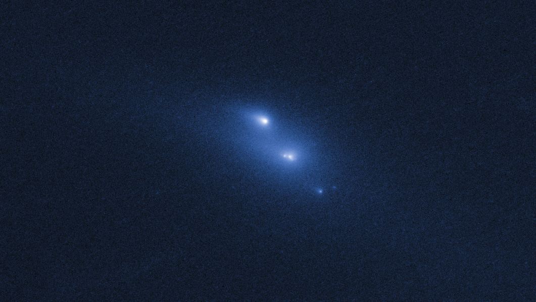 Disintegrating asteroid P2013 R3 as viewed by Hubble on 29 October 2013
