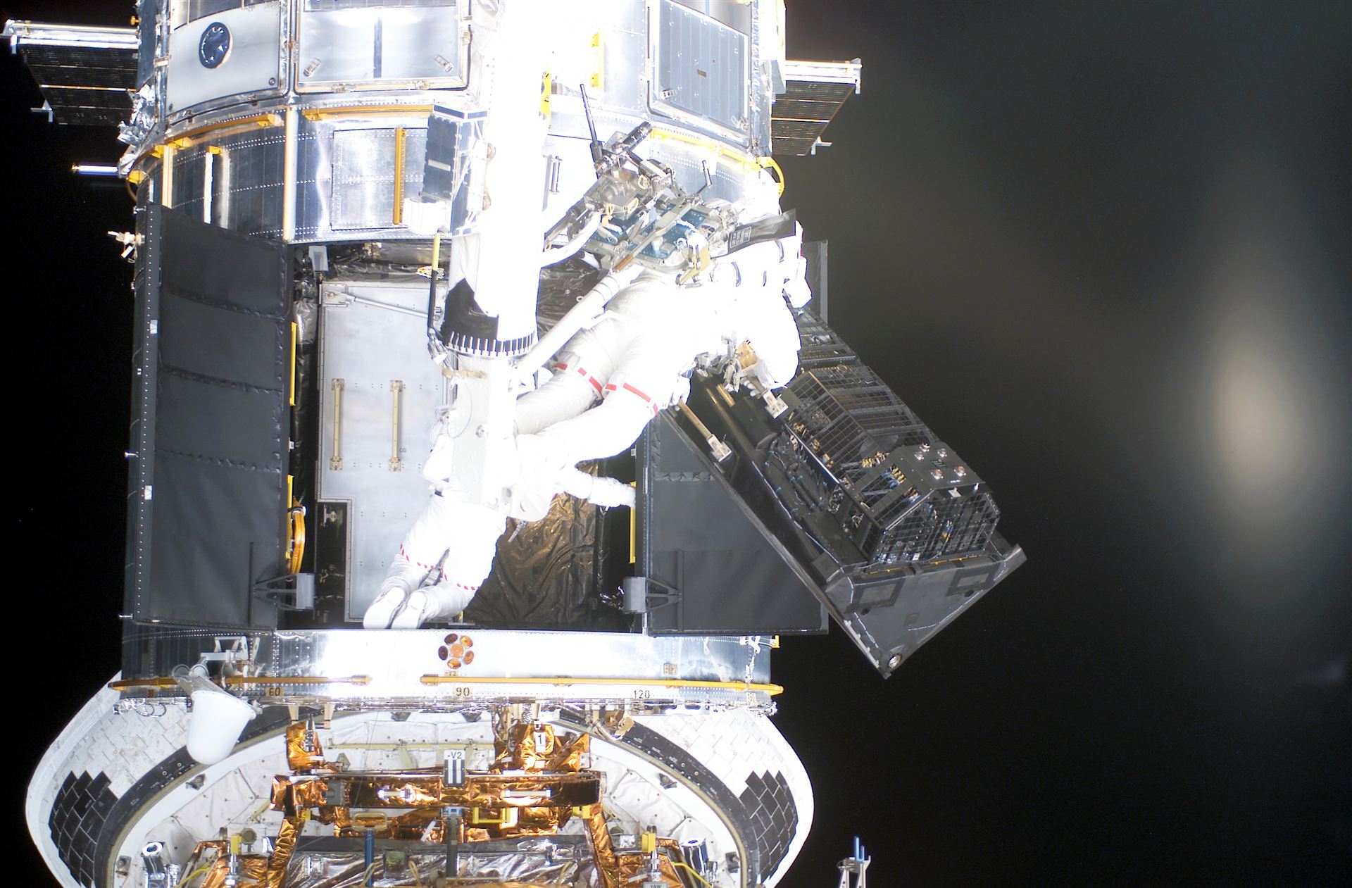 FOC being removed from the ESANASA Hubble space telescope during Servicing Mission 3B