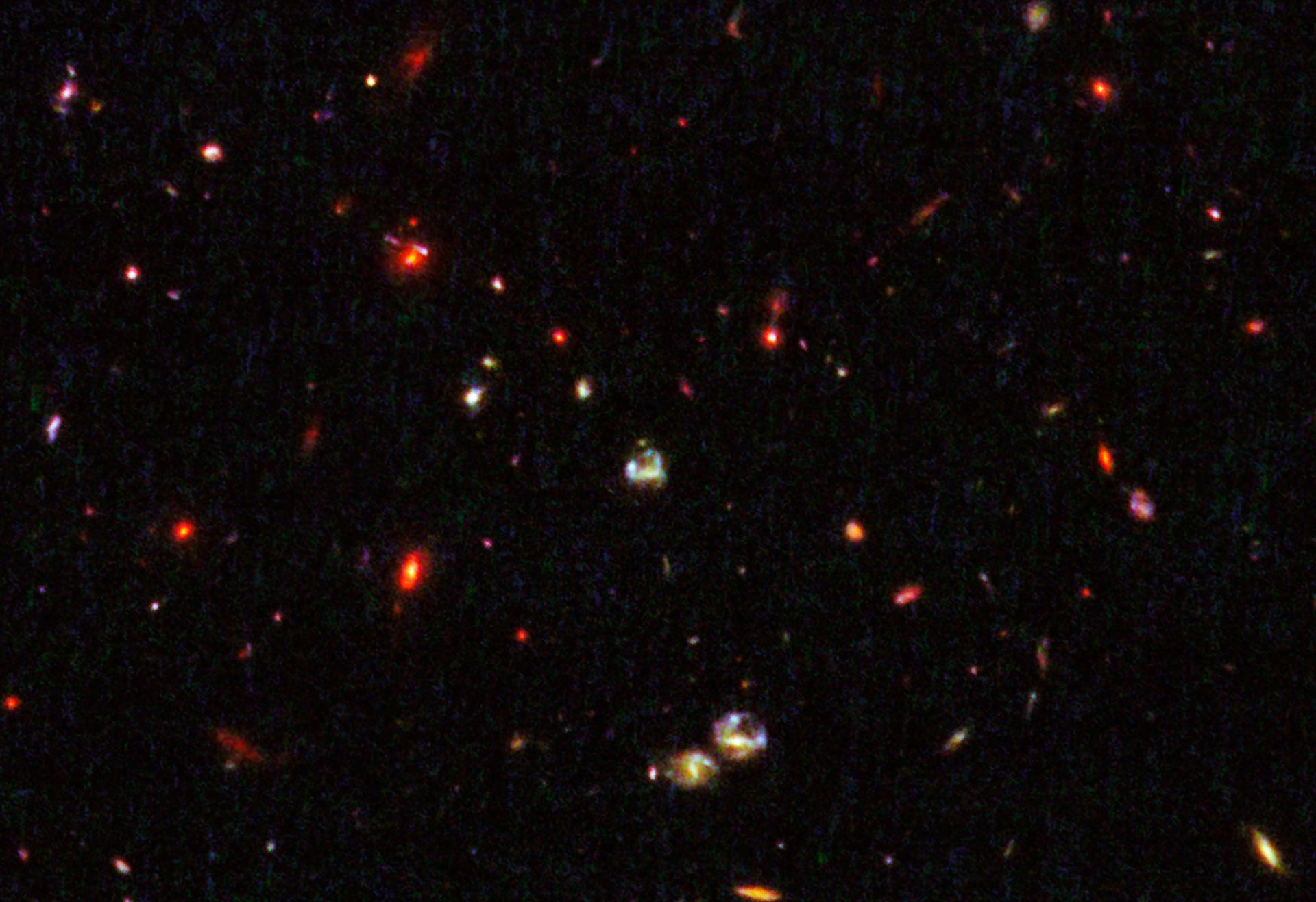 Gravitational lensing by galaxy in cluster IRC 0218