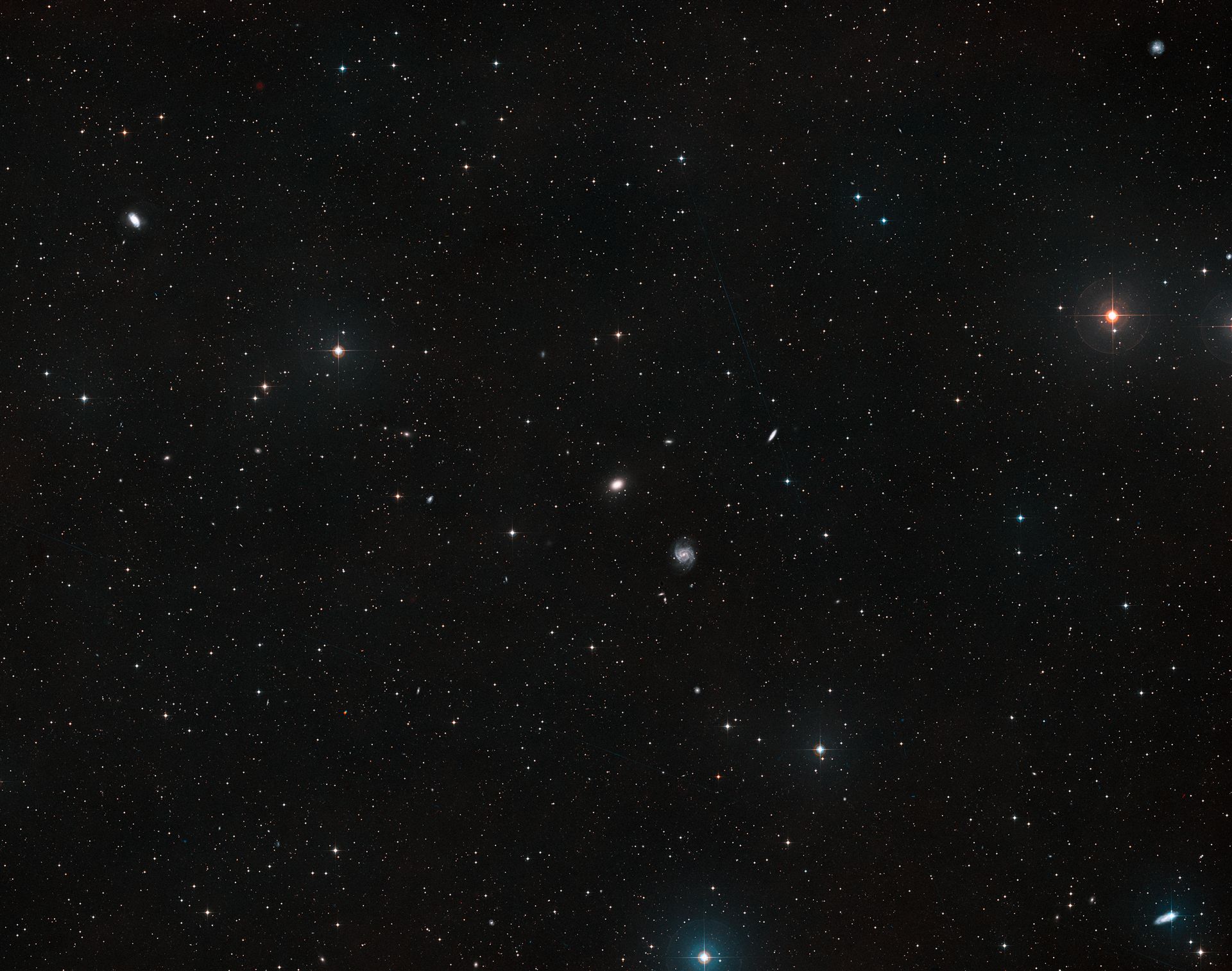 Ground-based view of the sky around the galaxies NGC 1052-DF4 NGC & 1052-DF2