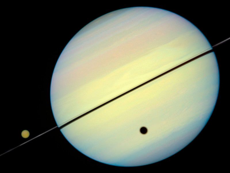 Hubble Catches Titan Chasing Its Shadow – Frame 3