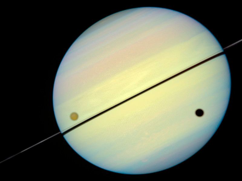 Hubble Catches Titan Chasing Its Shadow – Frame 4