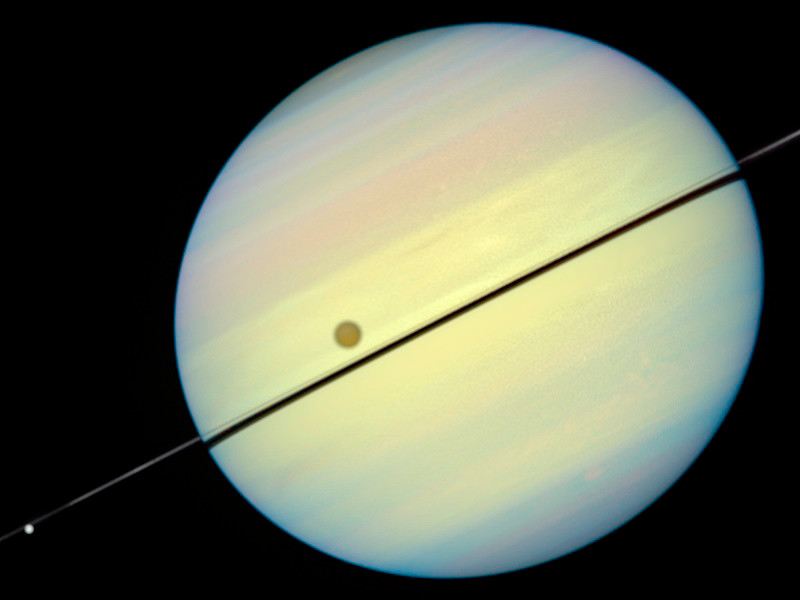 Hubble Catches Titan Chasing Its Shadow – Frame 5
