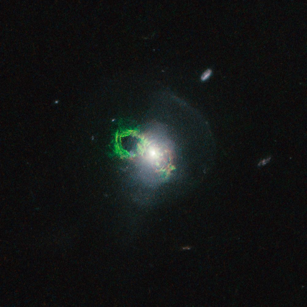 Hubble view of green filament in Teacup galaxy