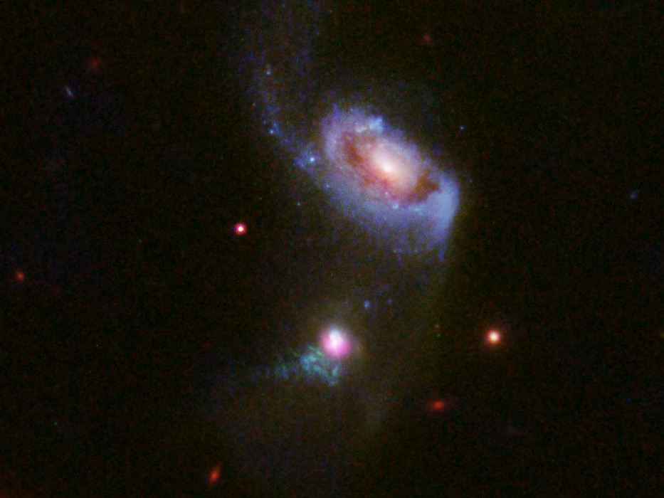 Hubble views a supermassive black hole burping — twice