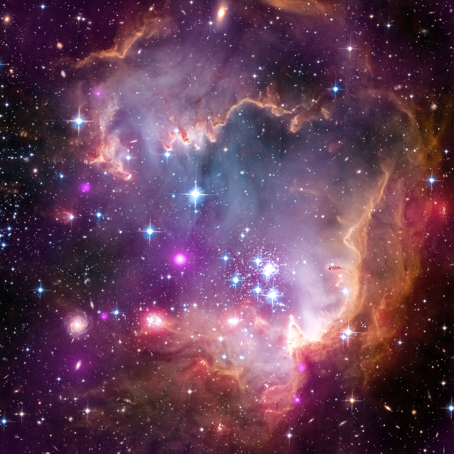 HubbleChandraSpitzer composite image of NGC 602, in the “wing” of the Small Magellanic Cloud