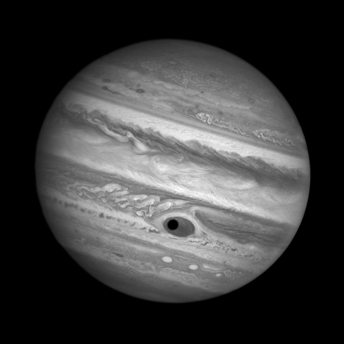 Jupiter&rsquo;s Great Red Spot and Ganymede&rsquo;s shadow — black and white