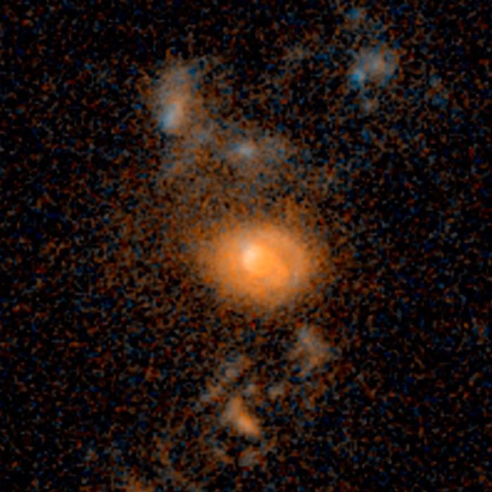 Merging galaxies — 6.2 billion light-years from Earth