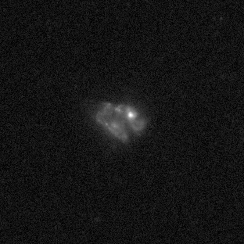 Outflows from merging galaxy J1558+3957