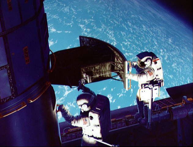 SM1 Artist Rendition of Astronauts on the Job