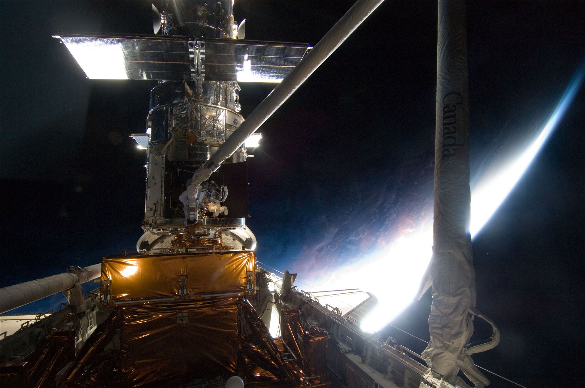 SM4 Astronaut Michael Good and the night sky