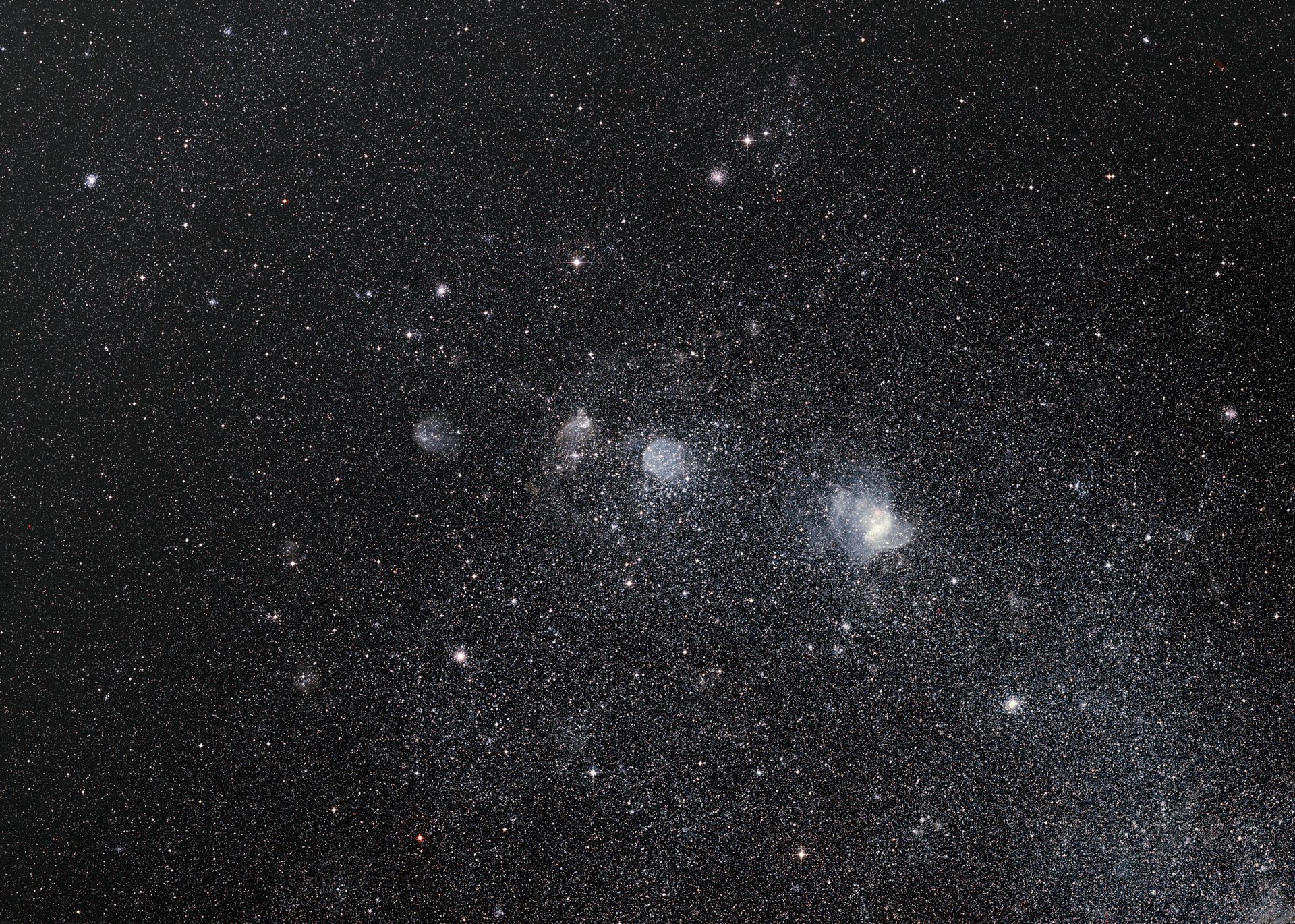 Wide-Field View of the Supernova Remnant 1E 0102.2-7219