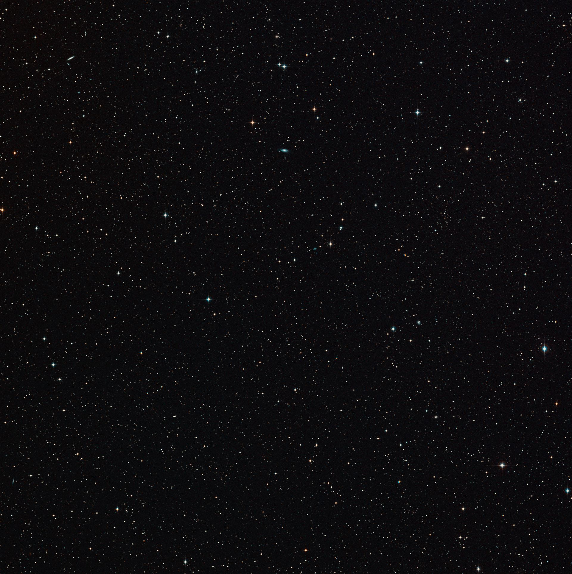 Wide-field view of the sky around the gravitationally lensed galaxy merger H-ATLAS J142935.3-002836